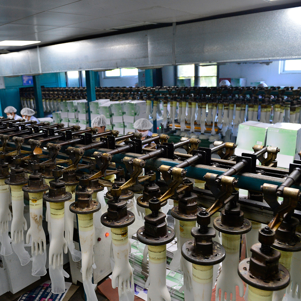 Disposable gloves on a production line.