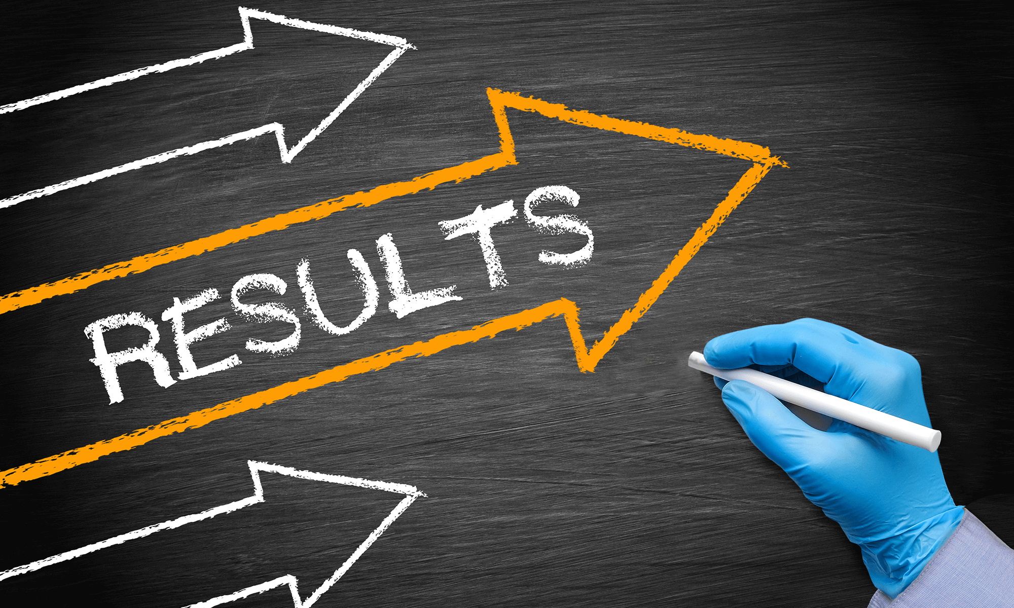 A hand wearing a single-use blue glove uses chalk to draw RESULTS and ascending arrows on a blackboard.